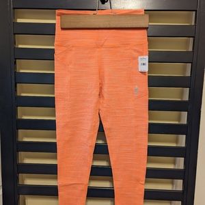 NWT Free People leggings, size small, neon mango combo